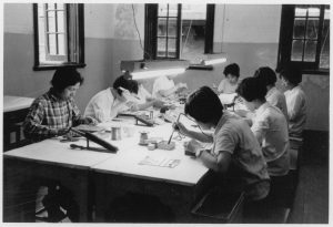 Chinese workers mounting components on printed circuit boards in Shanghai, 1972