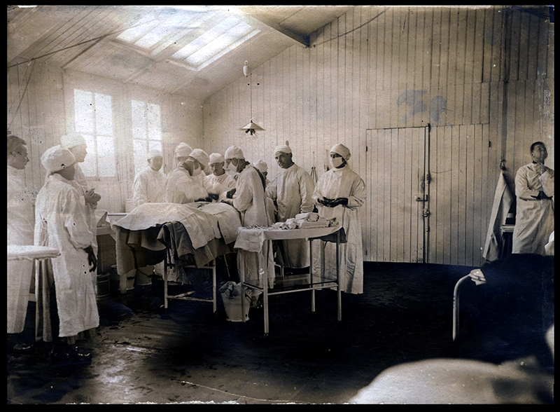Levi H. Fuson operates on a patient at Base Hospital 21 in Rouen, France.