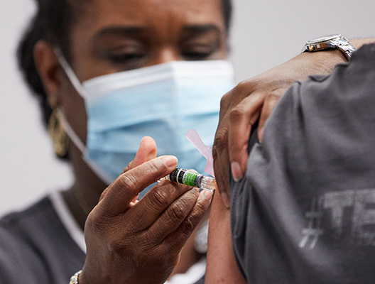 flu shot being given to student